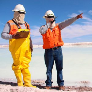 Two SQM workers are seen in a lithium plant