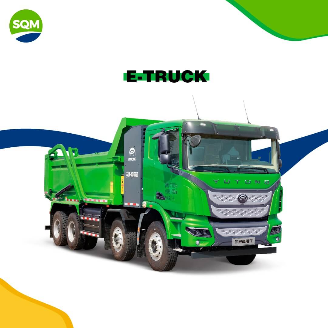 You can see in the image a green garbage truck that says e-truck indicating that it is an electric vehicle